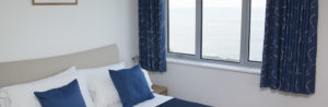 Crantock Bay Apartment 14 master bedroom 300x98 - Crantock Bay Apartment 14 master bedroom